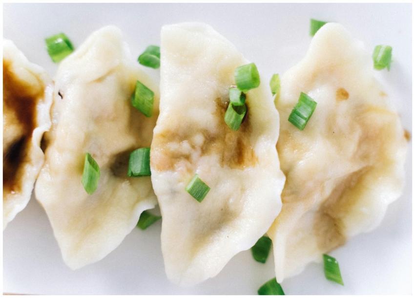 Appetizing close-up of Chinese dumplings garnished