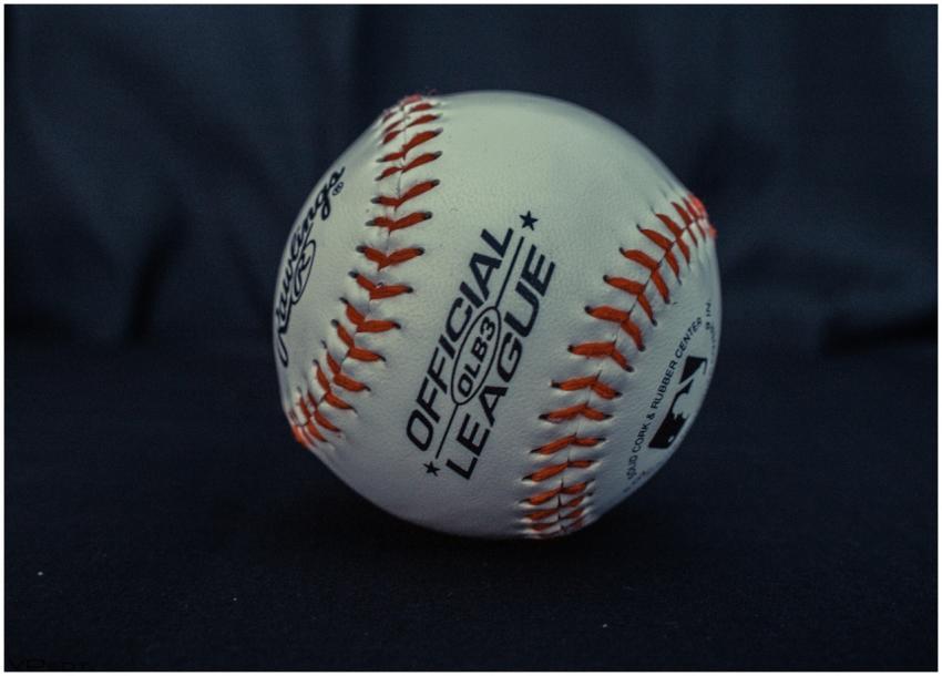 Detailed close-up of an official league baseball w
