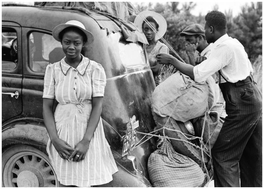Vintage black and white photo of people preparing