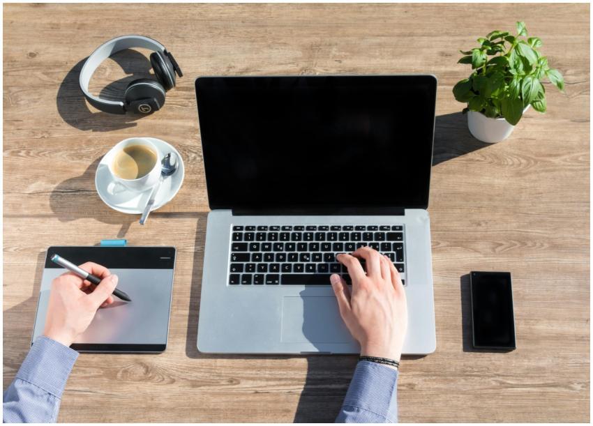 A stylish home office workspace featuring a laptop