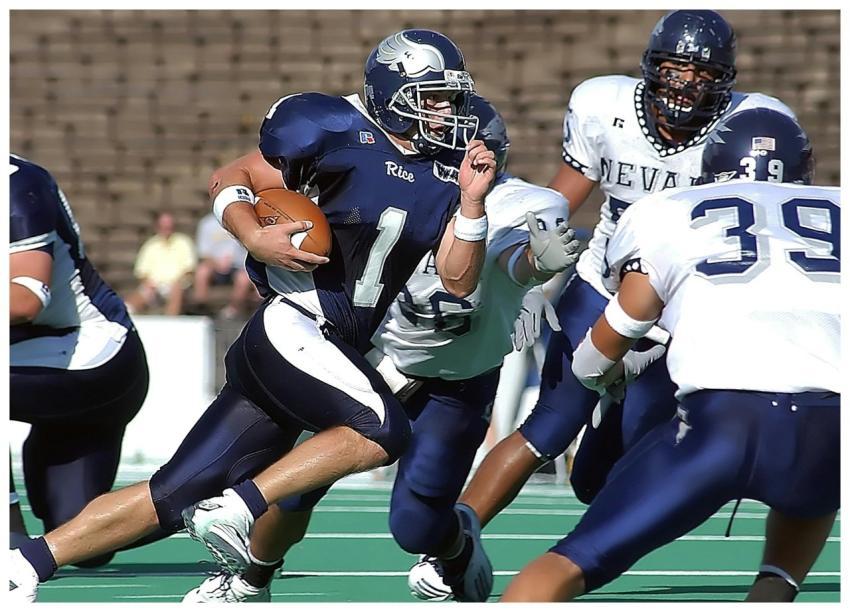 Athletes compete fiercely in an intense American f