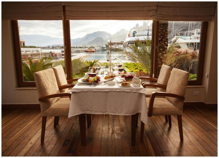 Elegantly set table in a seaside restaurant with a