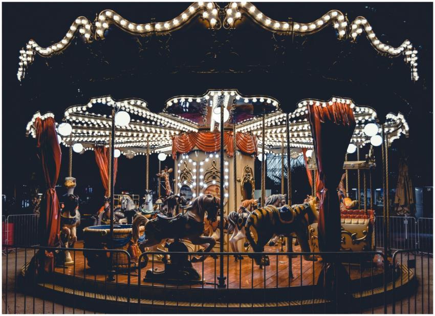 A beautifully illuminated carousel spins in Buchar