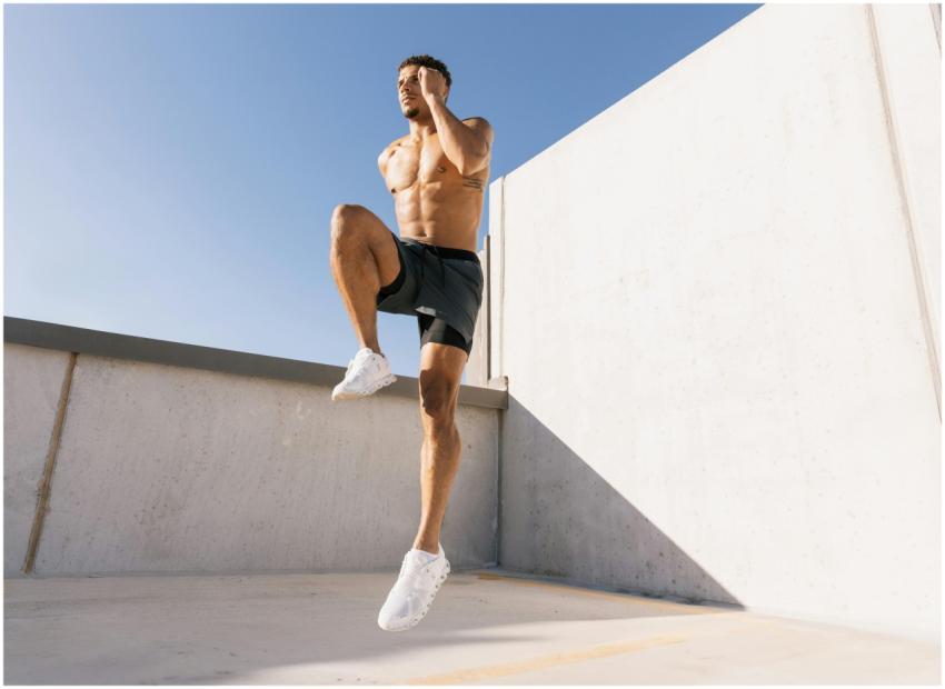 Male athlete doing cardio workout on a rooftop und