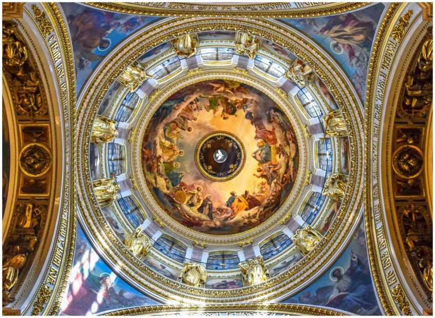 Intricate view of a cathedral dome featuring relig