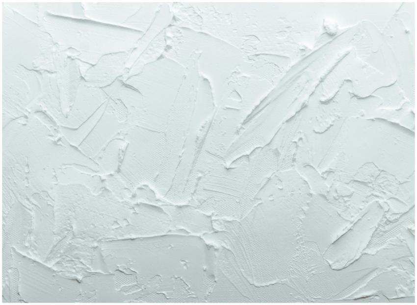 Close-up shot of a white textured surface with abs