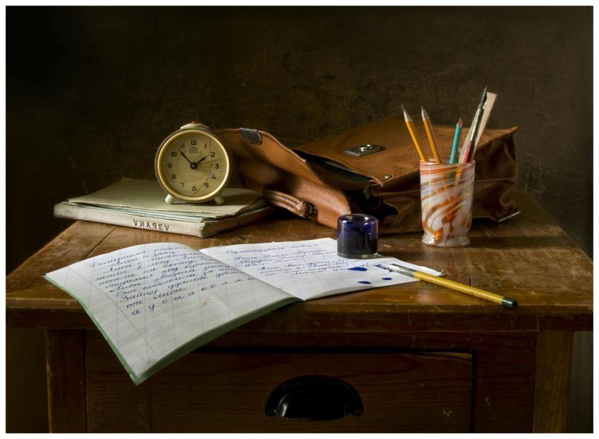 Classic wooden desk with writing materials, vintag