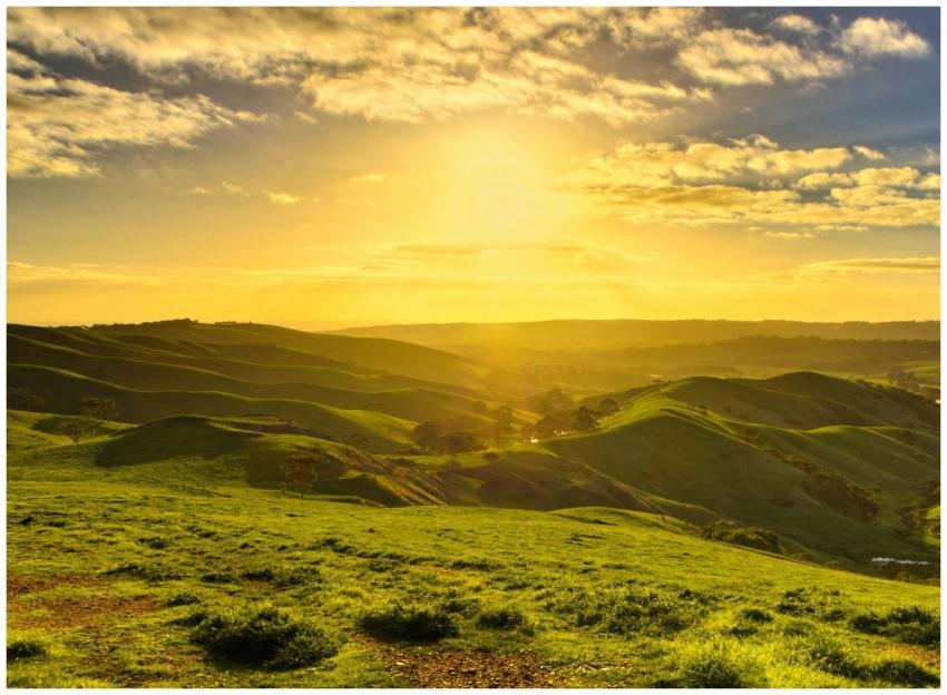 Beautiful sunrise over rolling hills in Yankalilla