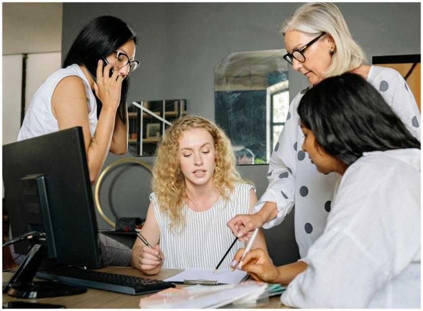 A diverse group of businesswomen engaged in a coll