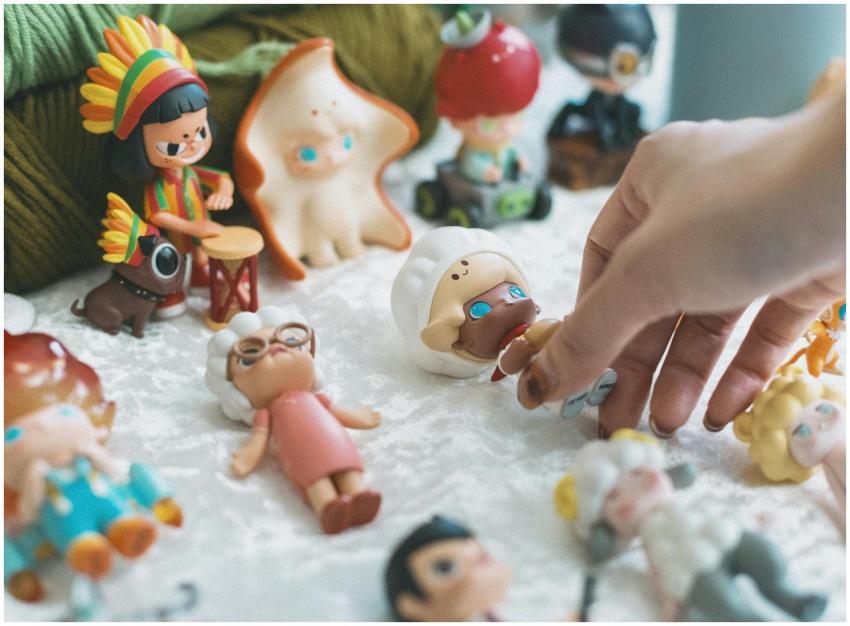 A variety of playful and artistic figurines displa