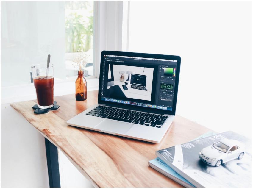 A cozy home office setup featuring a laptop and ic
