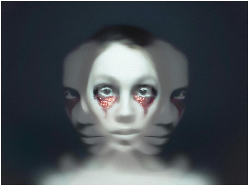 A hauntingly surreal portrait featuring abstract a
