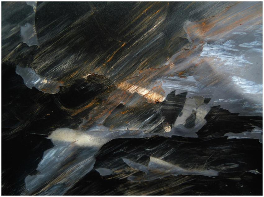 A detailed closeup capture of a mineral surface wi