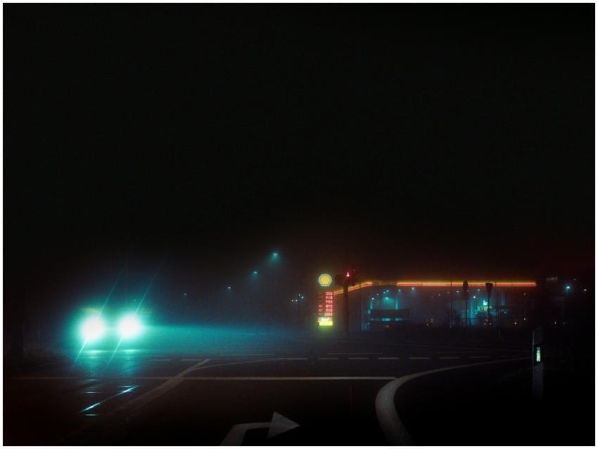 A gas station illuminated at night in Straelen, NR
