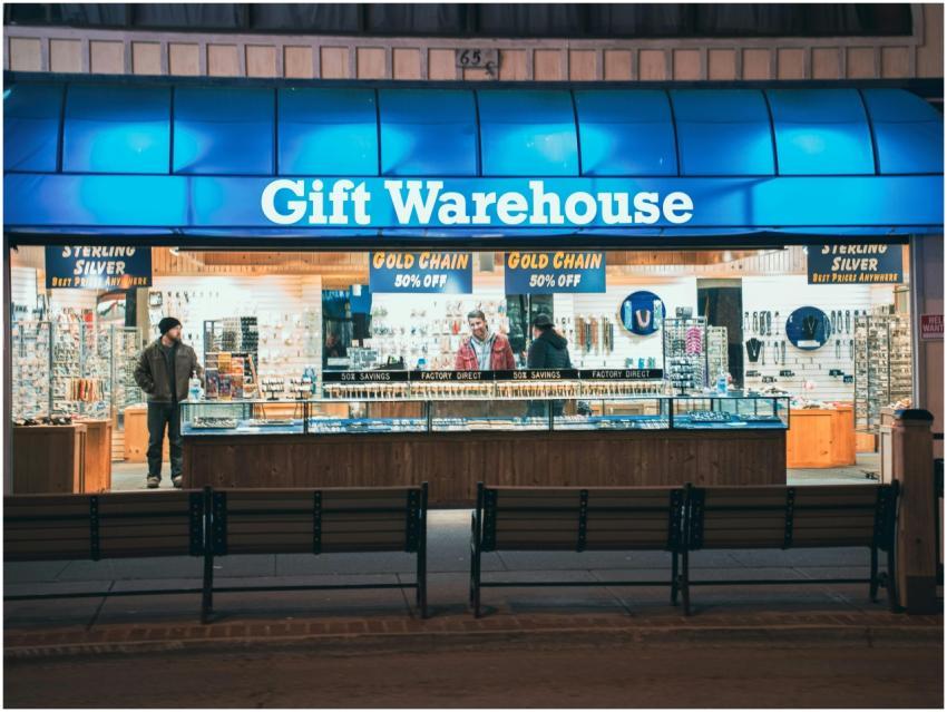 Night view of Gift Warehouse store with vibrant bl