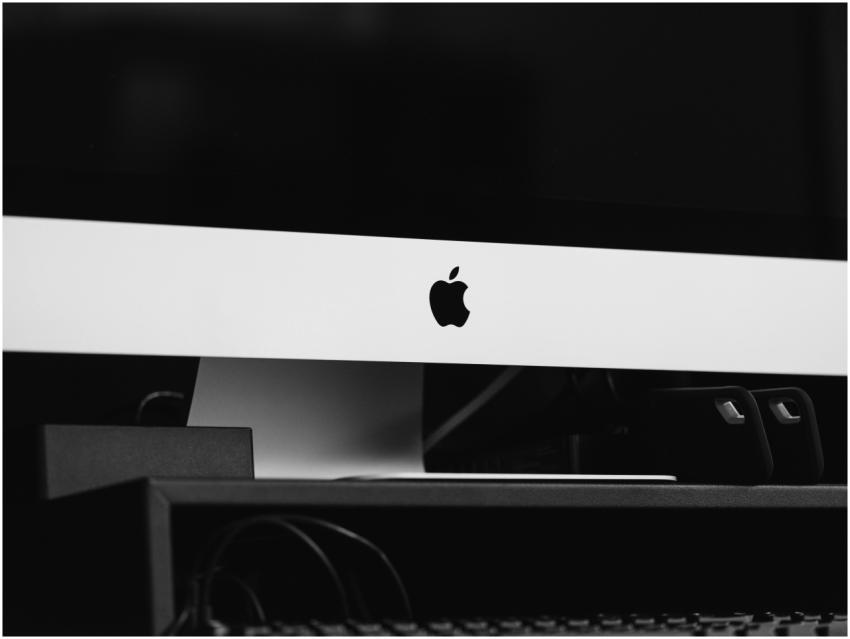 Sleek black and white minimalist desktop setup fea