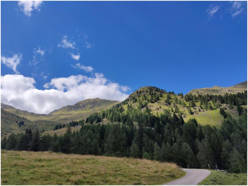 Breathtaking view of green mountains and blue sky