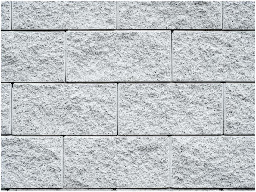 Detailed texture of a white brick wall, perfect fo