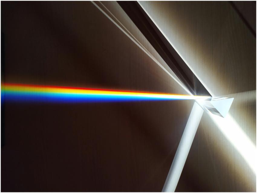 A colorful spectrum of light refracted through a g