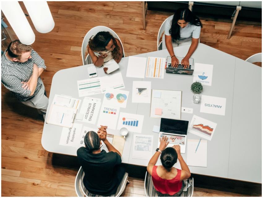 A diverse group working on marketing strategies wi