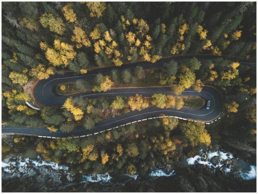 A stunning aerial shot capturing a curvy road thro