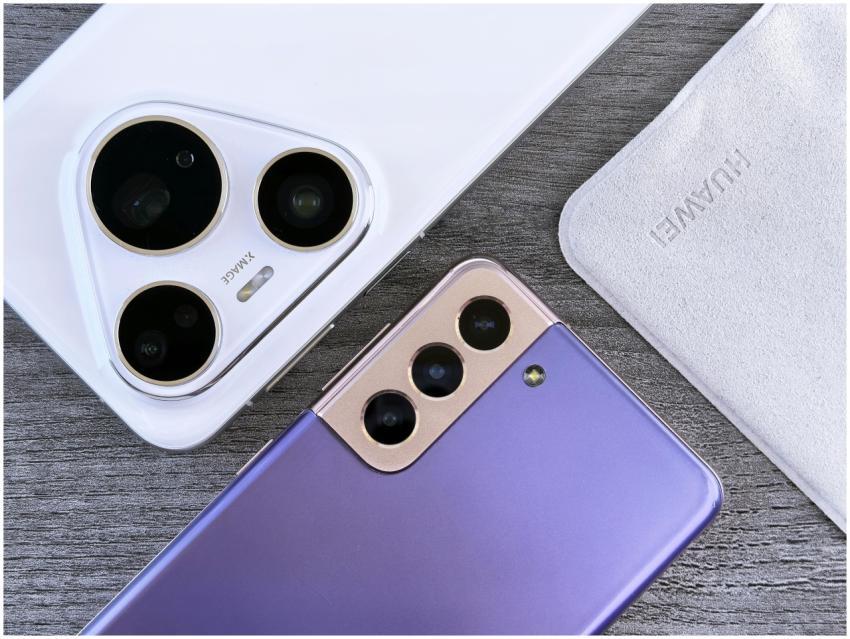 Close-up of two smartphones with camera focus on a