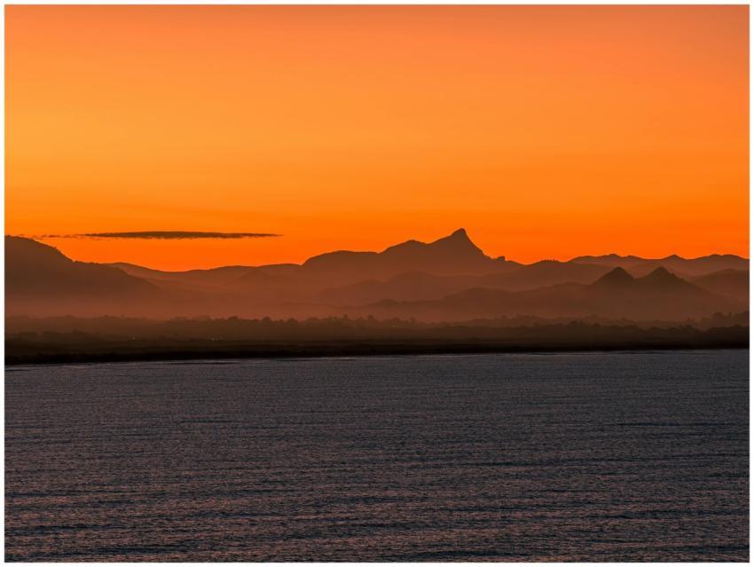 Vibrant sunrise over Byron Bay with a scenic view
