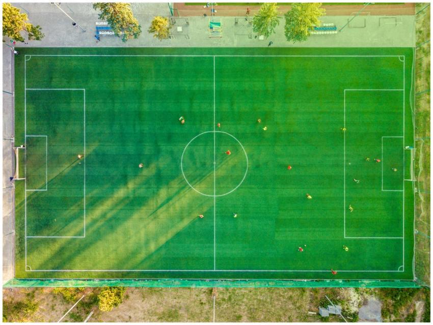 Aerial shot of a soccer game with players on a vib