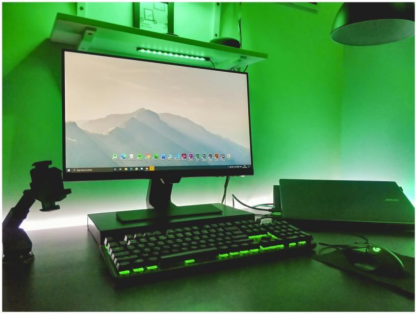 Stylish workspace featuring a desktop, keyboard, a