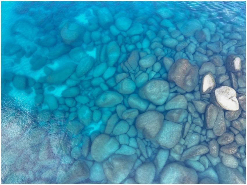 A stunning aerial shot of turquoise stones under c