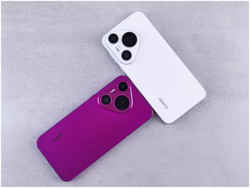 Two Huawei smartphones, one white and one purple,