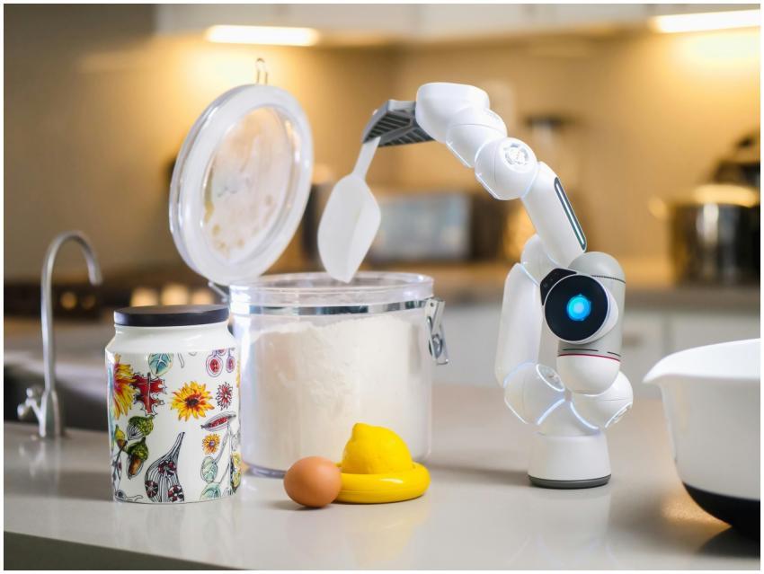 A robotic arm measuring flour on a modern kitchen