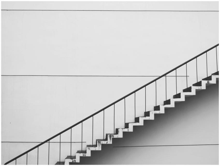 Minimalistic black and white staircase with sharp