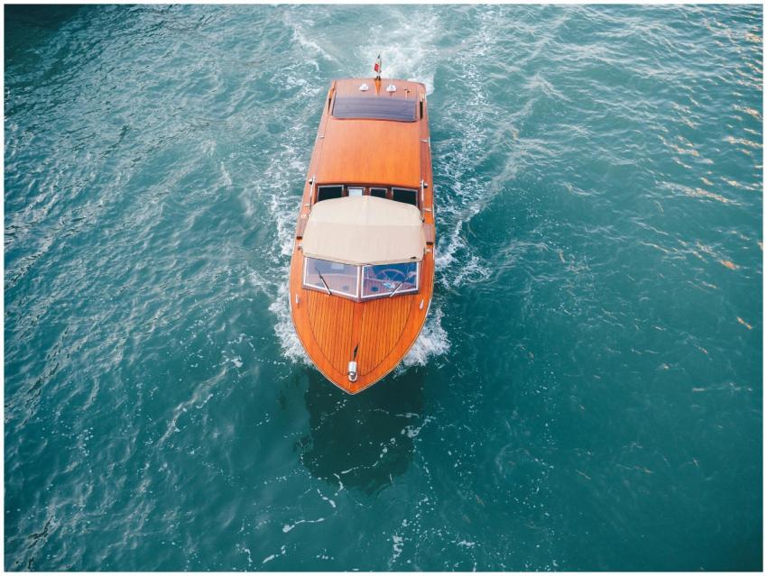 Overhead view of a classic wooden boat navigating