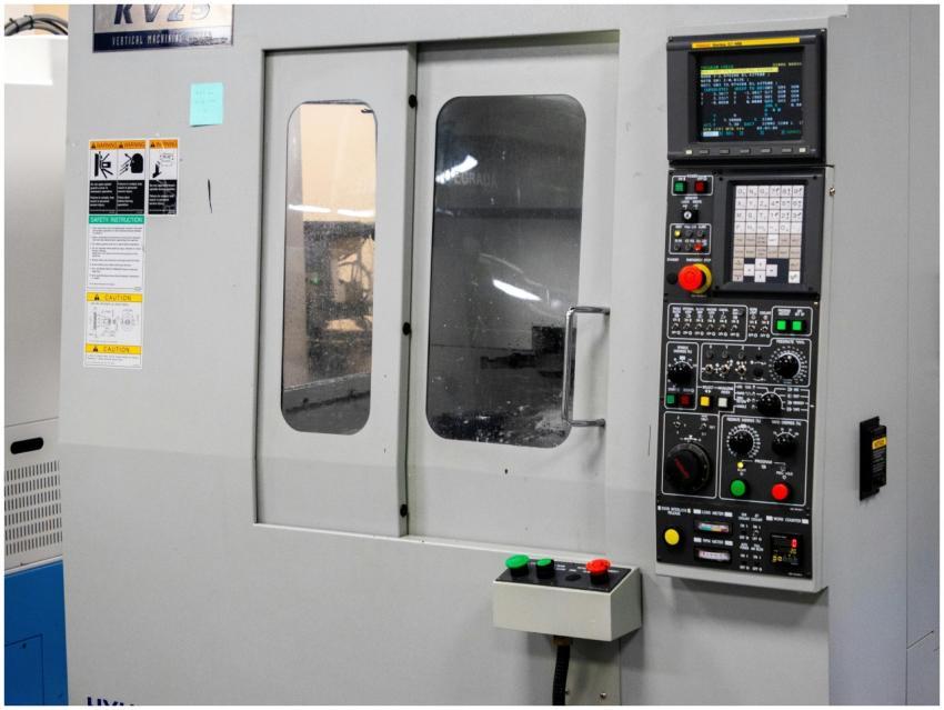 A modern CNC machine control panel used for precis