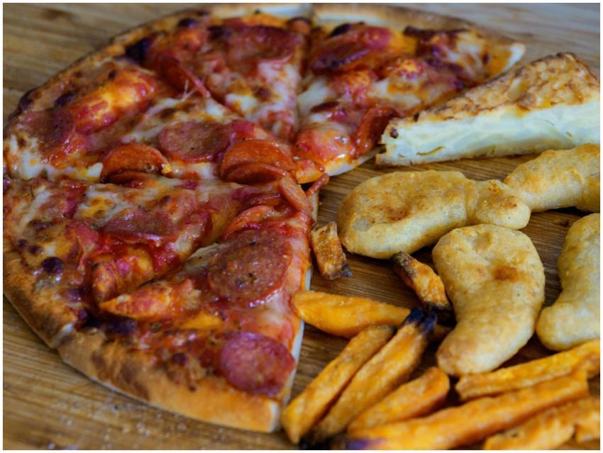 A close-up shot of pizza, Spanish omelette, sweet