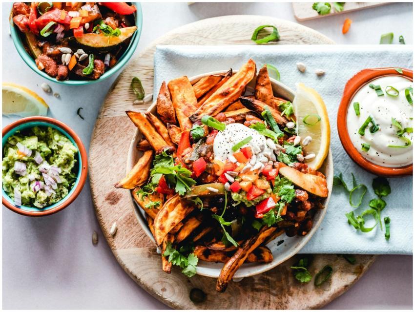 A vibrant platter of savory sweet potato fries wit