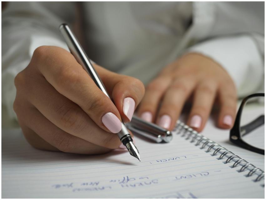 A detailed image of handwriting in a notebook with