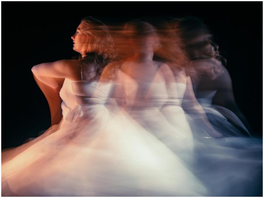 Creative motion blur of a woman in a wedding dress