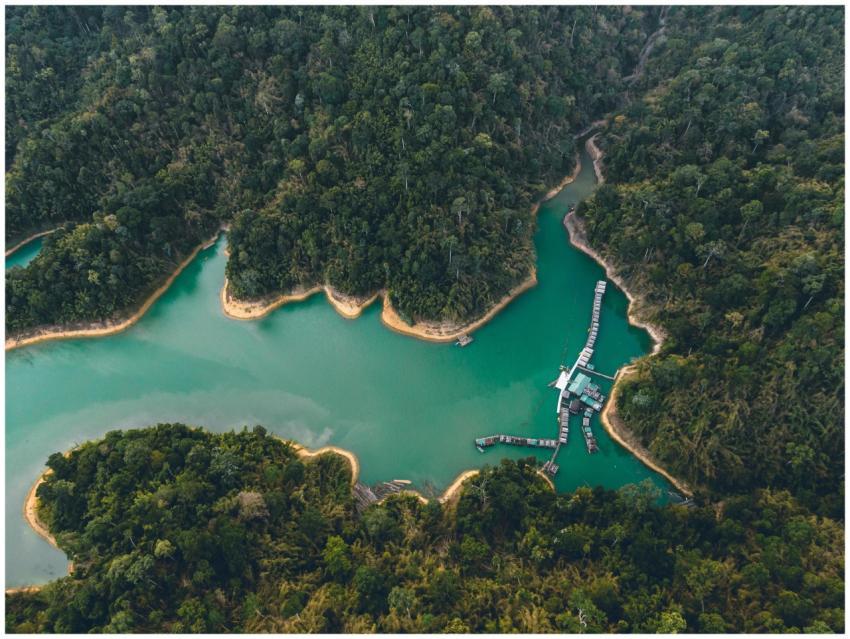 Breathtaking drone view of houses on water and san