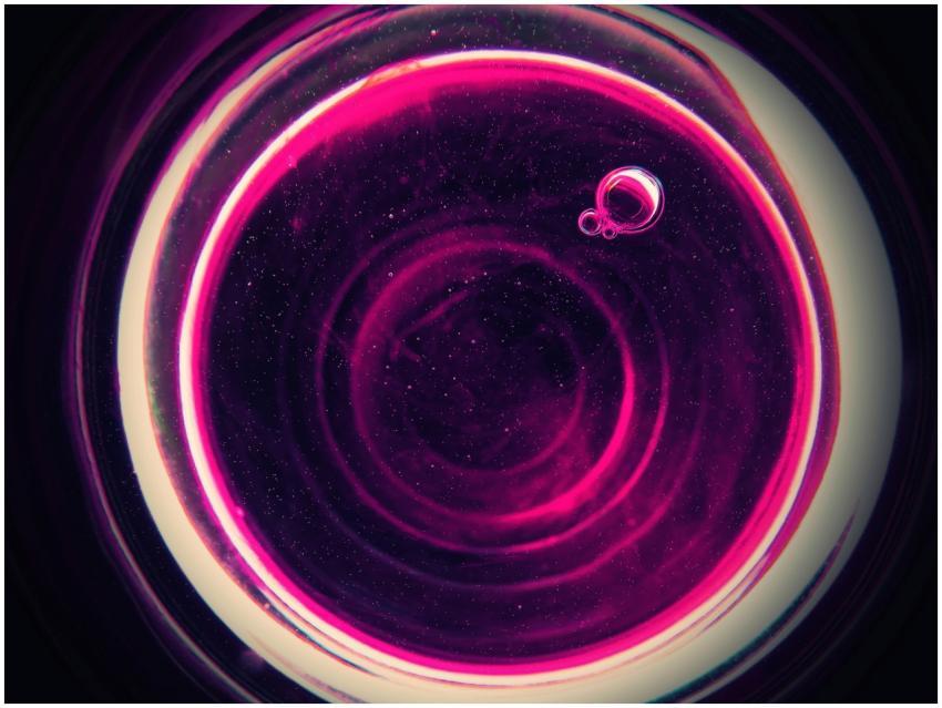 Vibrant abstract pink bubbles forming a circular p
