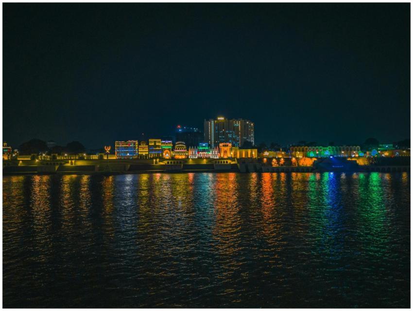 Colorful reflections on the river at night showcas