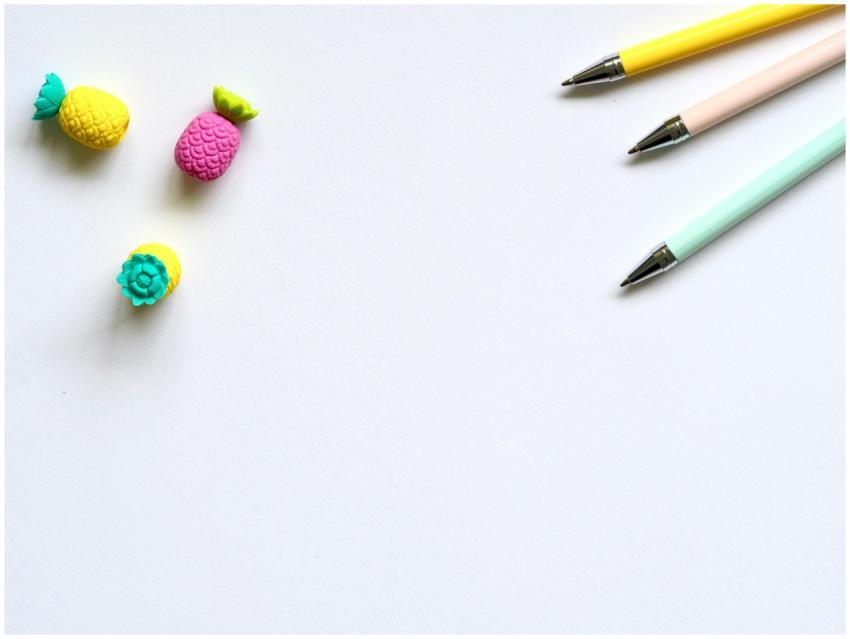 Top-down view of colorful pens and erasers arrange