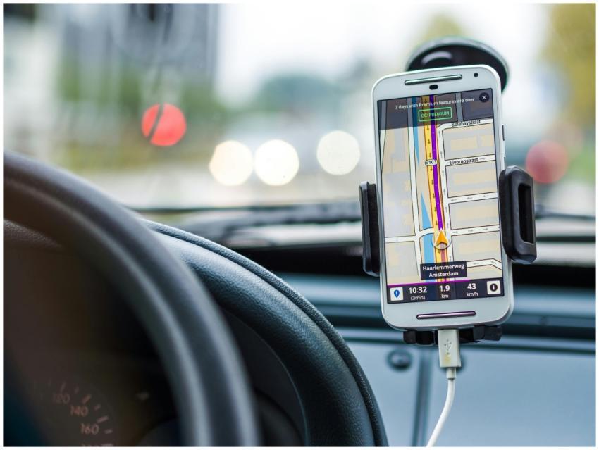 Smartphone mounted in car using GPS for navigation