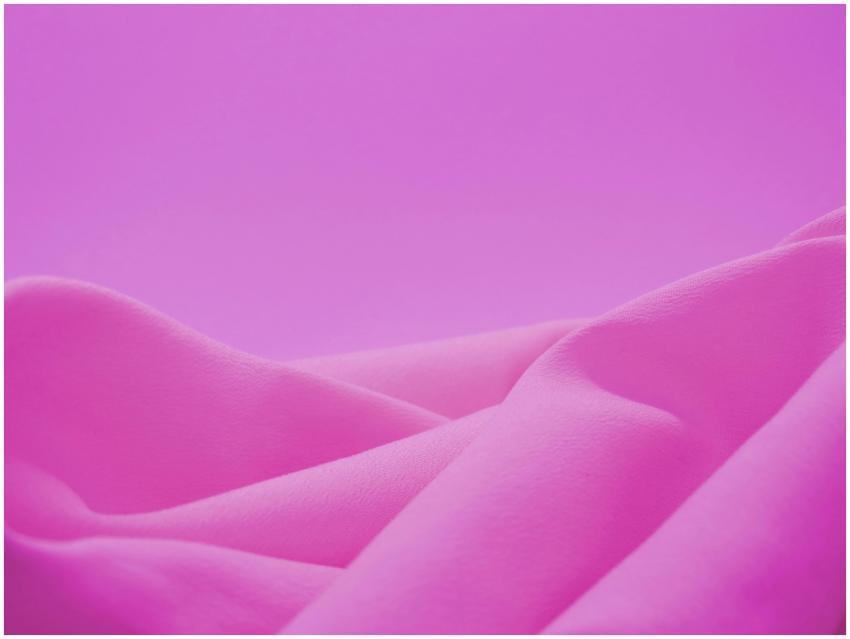 Vibrant pink fabric abstract texture ideal for bac