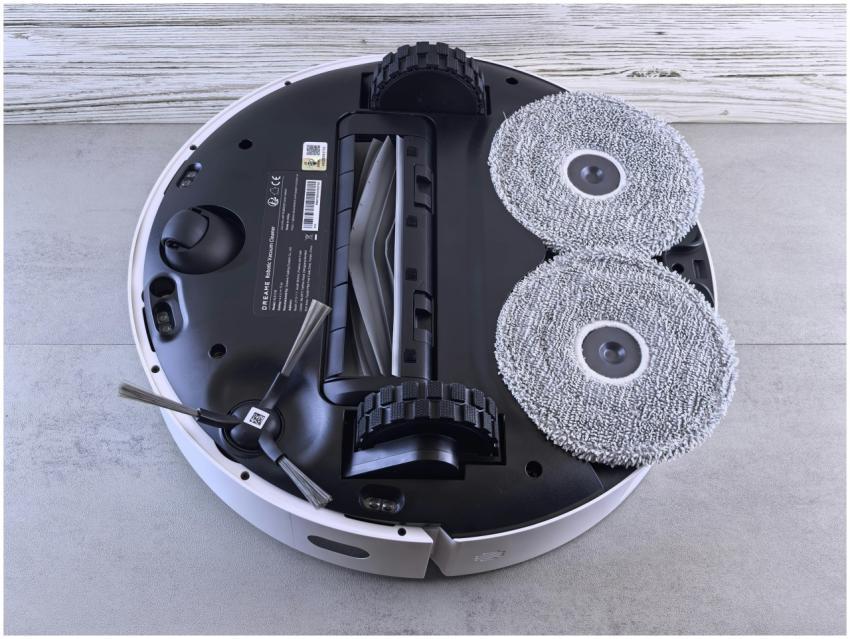 Detailed view of a robotic vacuum cleaner's unders