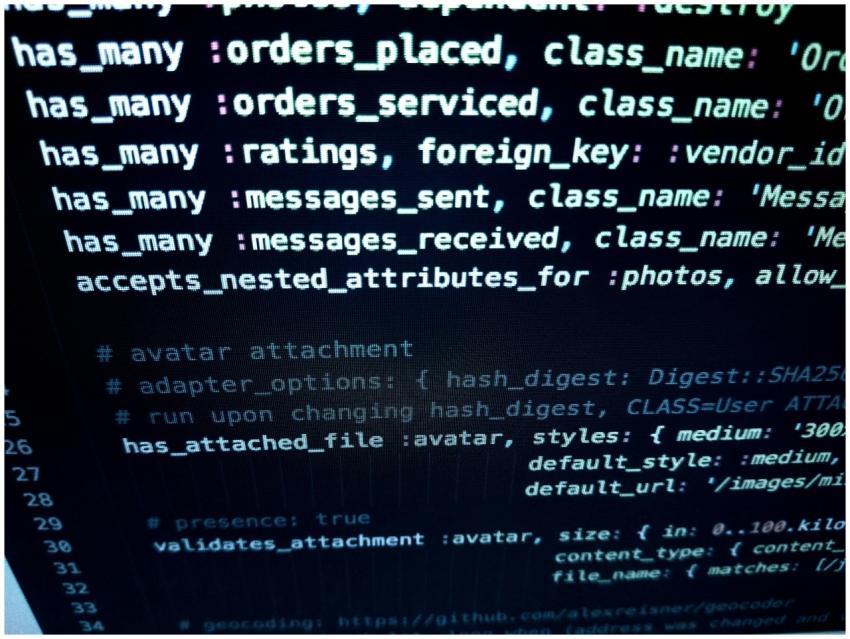 Close-up image featuring detailed programming code