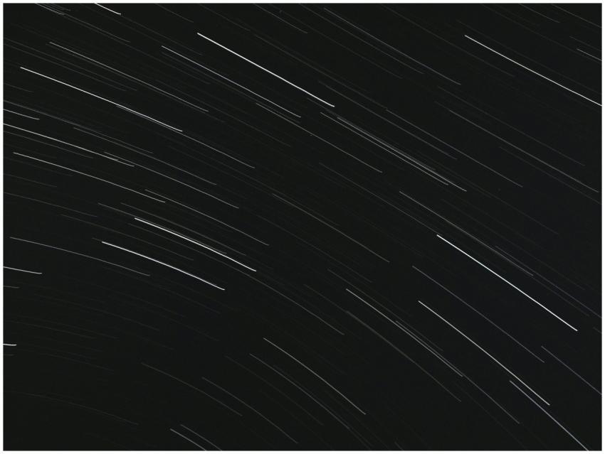 From below of bright glowing stars in long exposur