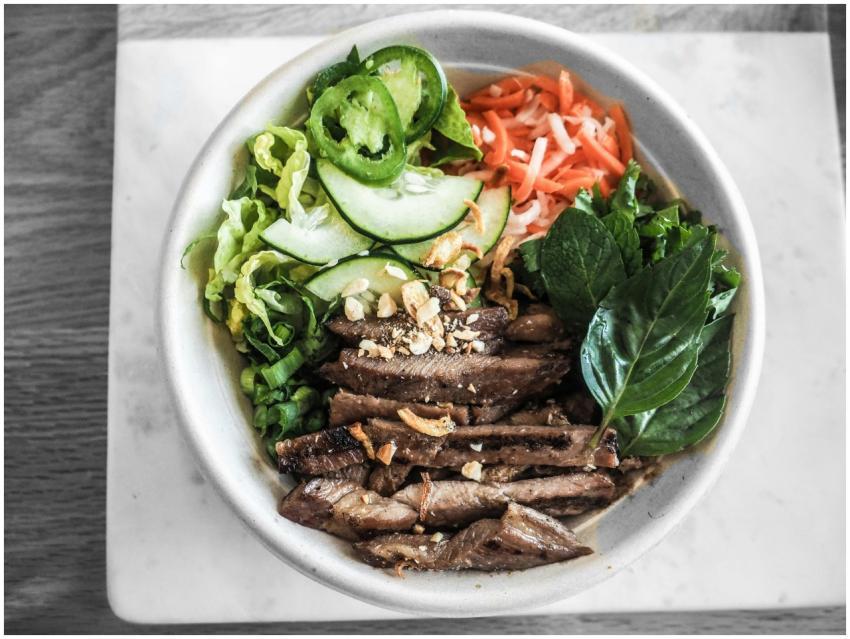 Delicious Vietnamese beef salad bowl with fresh ve