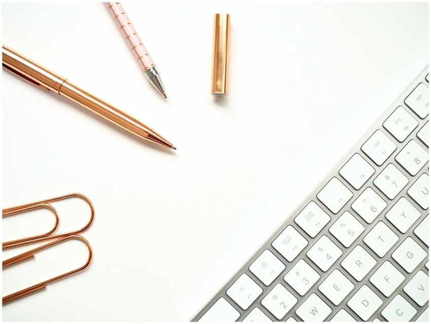 Elegant minimalist workspace featuring rose gold p